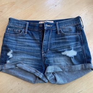 Distressed High Rise Rolled Hem Jean Shorts